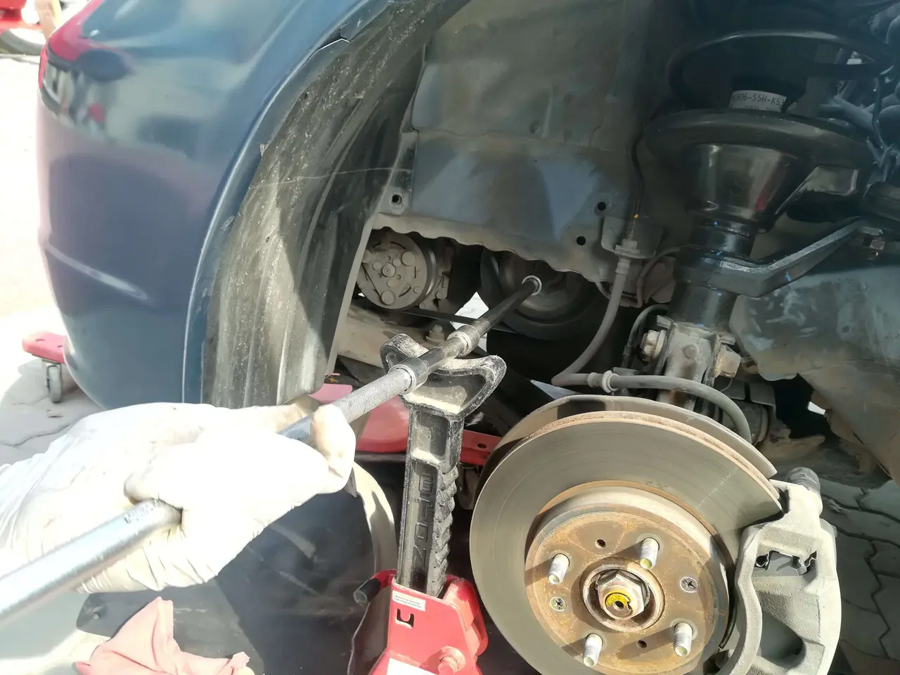           Removing power steering reservoir