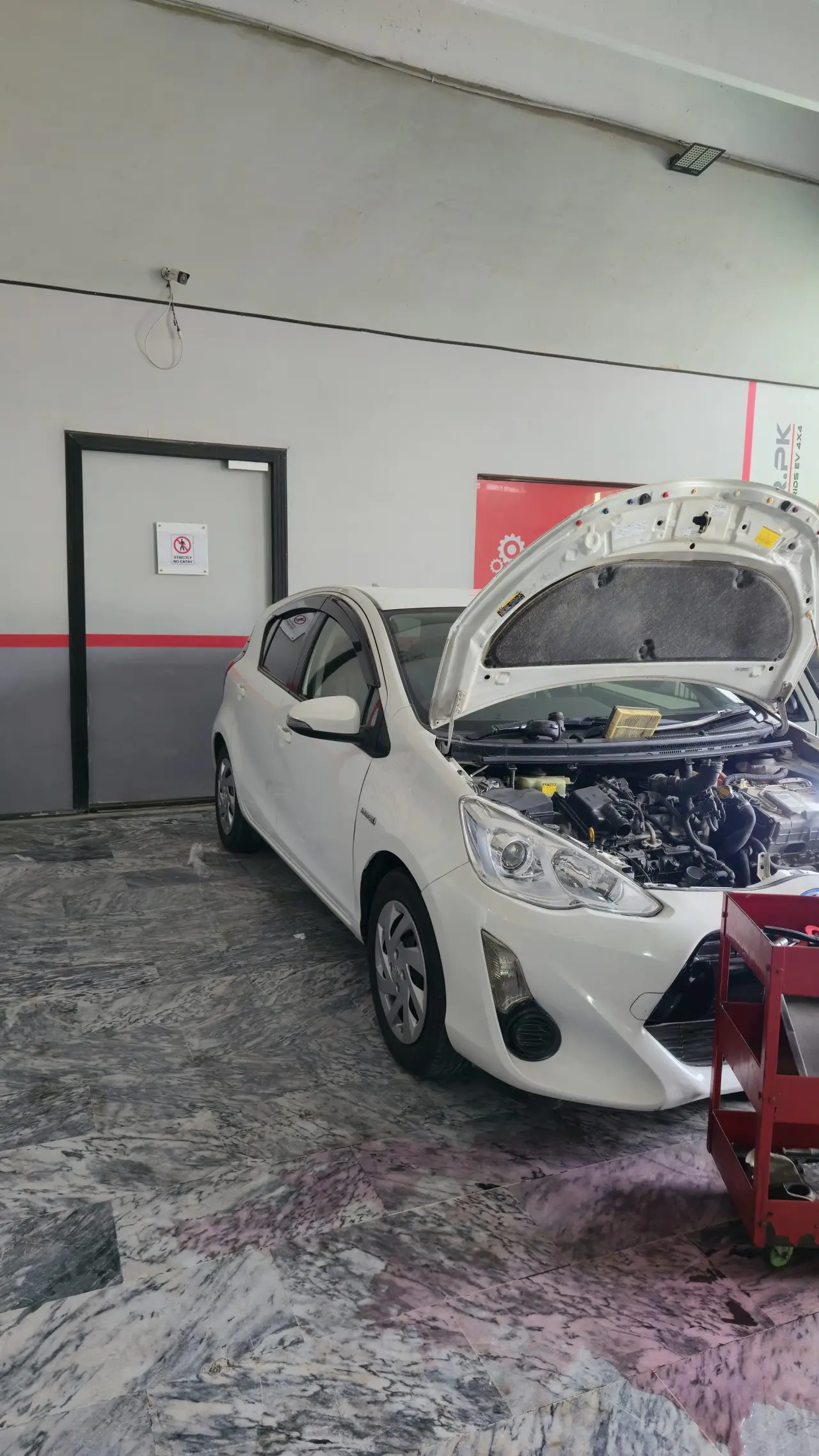 Toyota Aqua hybrid parked for workshop service