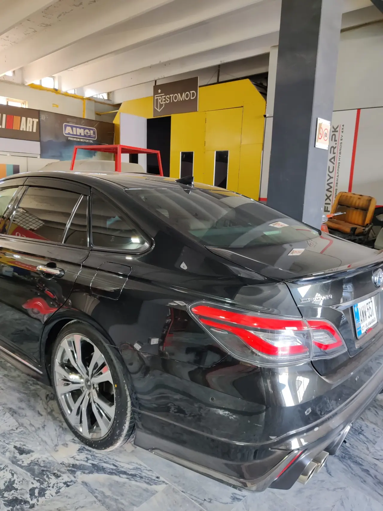 Toyota Crown hybrid service in the workshop